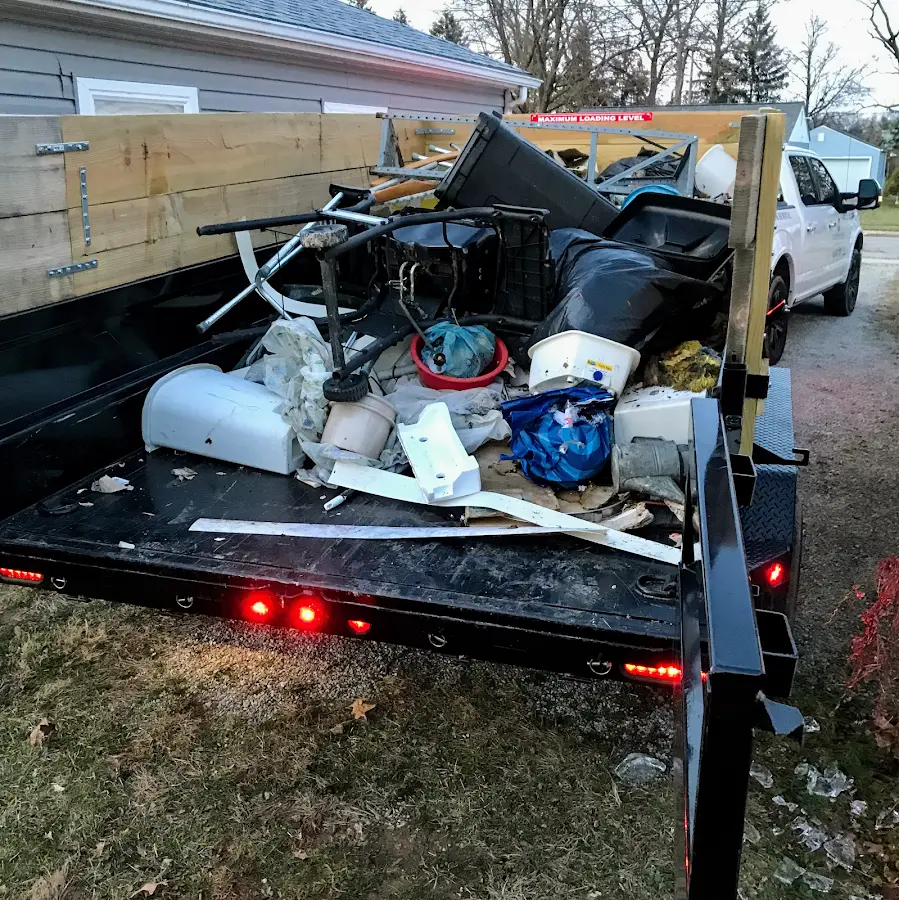 Roll-off dumpster delivered to a residential driveway in Wayne